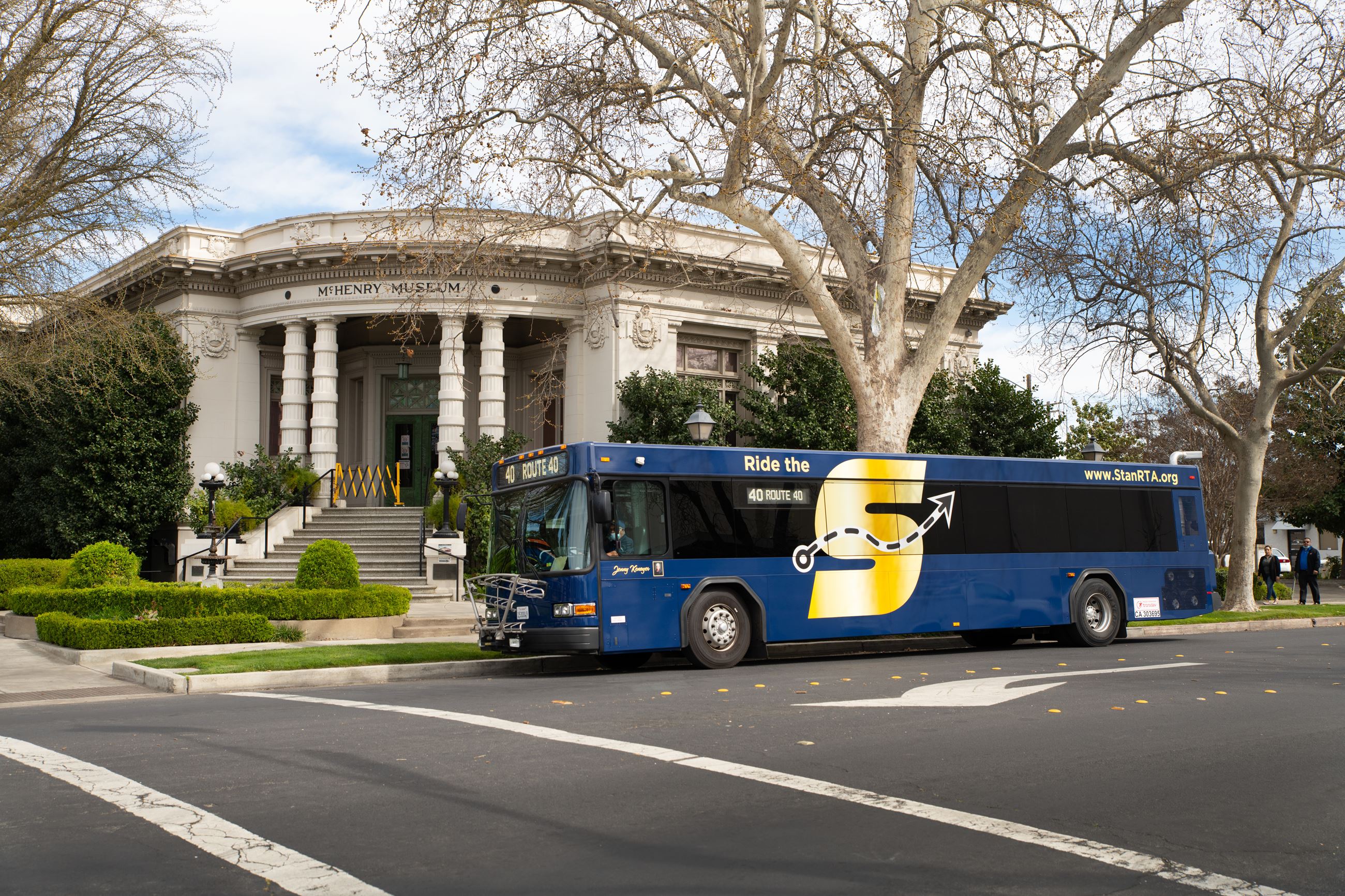 The S Bus parked in front of the McHenry Museum